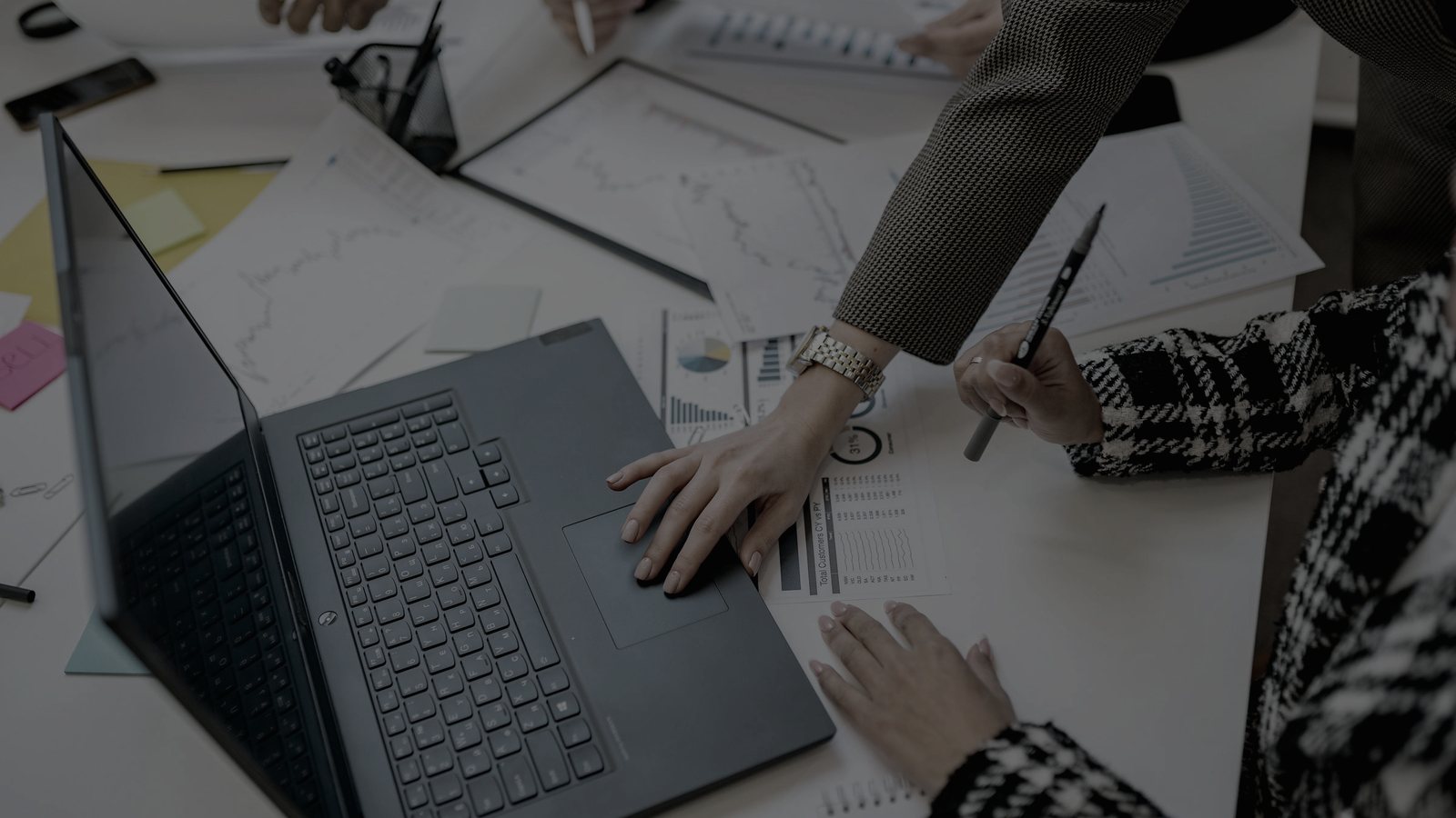 Commercial team reviewing AI-era revenue growth and pipeline data