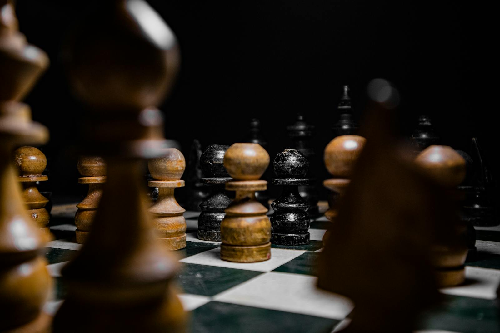 Chess pieces arranged in strategic formation, signalling deliberate market positioning