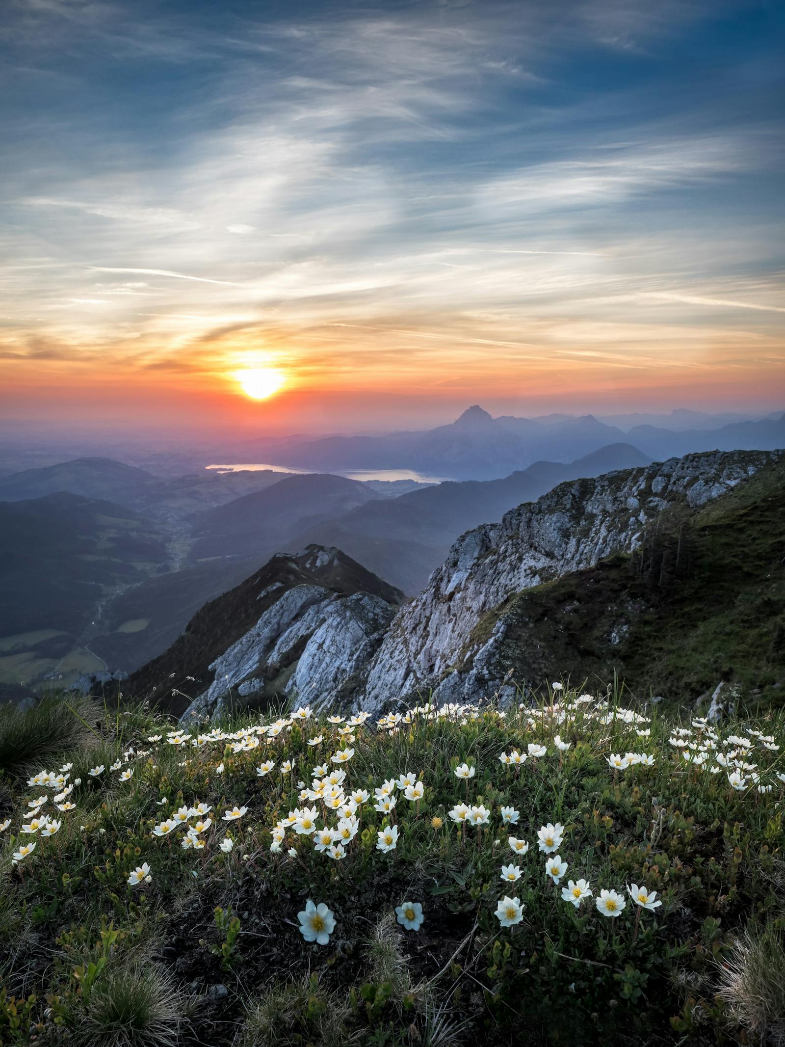 Open mountain road at dawn rising toward the horizon