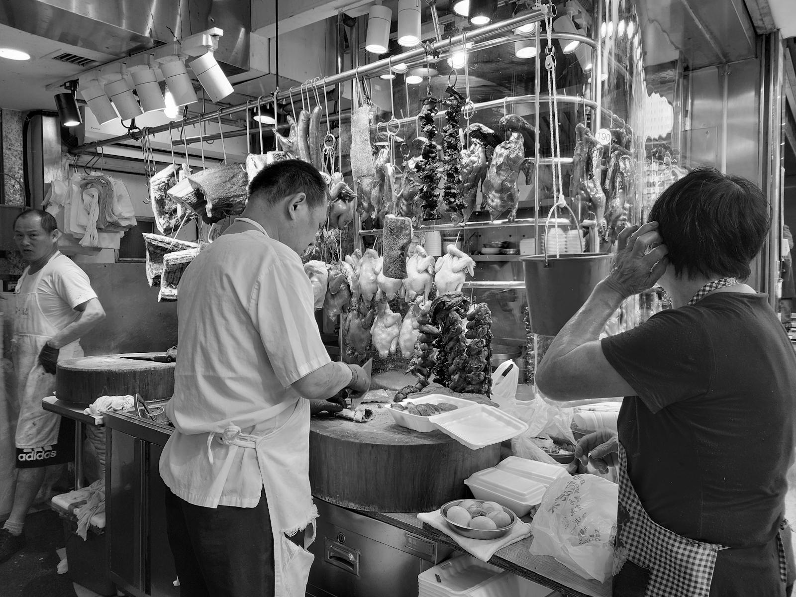 Busy restaurant kitchen operations during service
