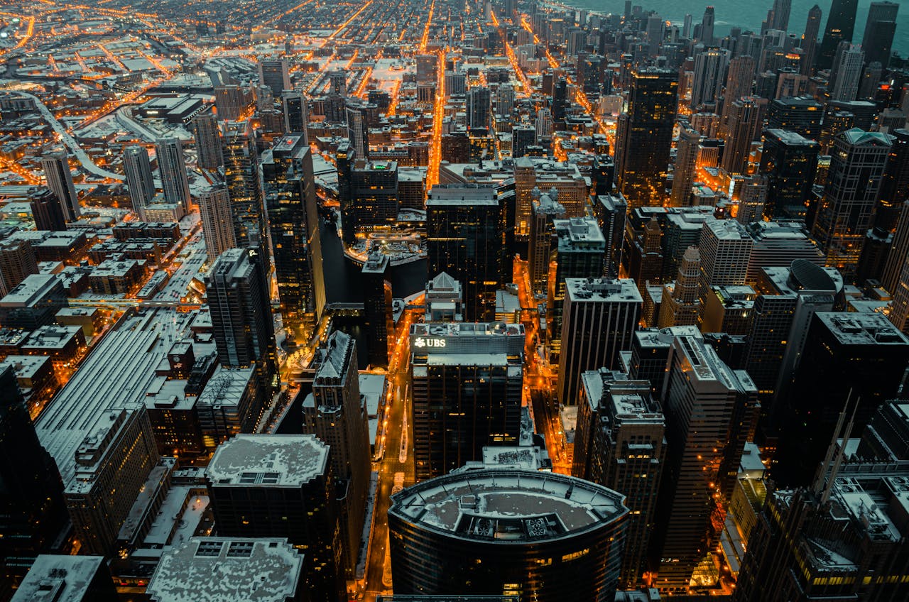 City business district at dusk representing commercial market signals
