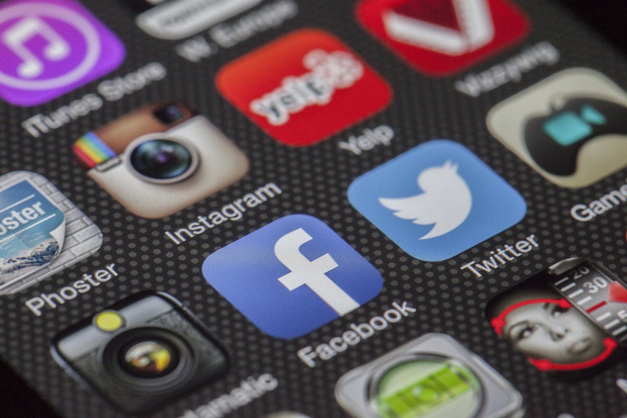 Social media app icons representing digital presence and buyer discovery signals